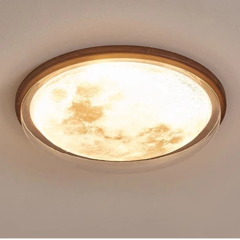 Ceiling light fixture with wooden frame and warm glow on a neutral background