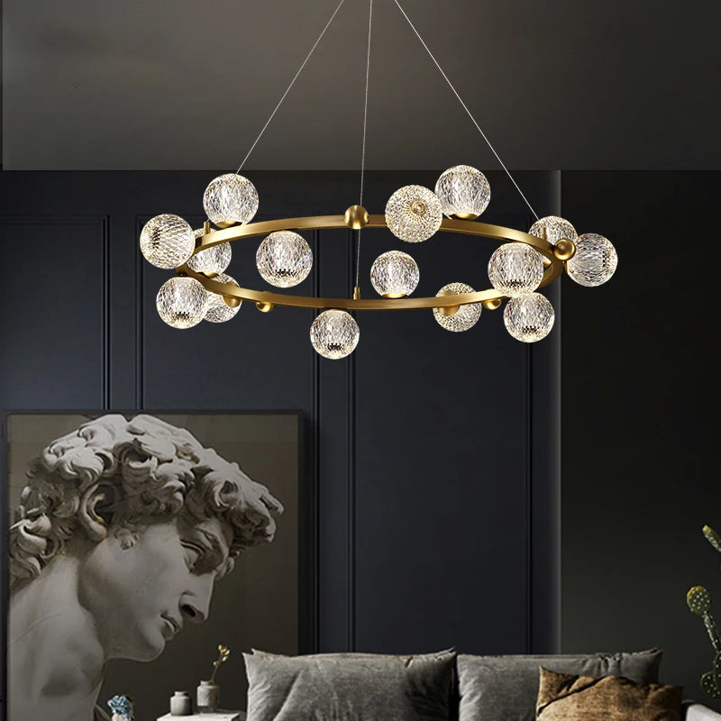 Alloy and glass globe chandelier lighting up a stylish living room