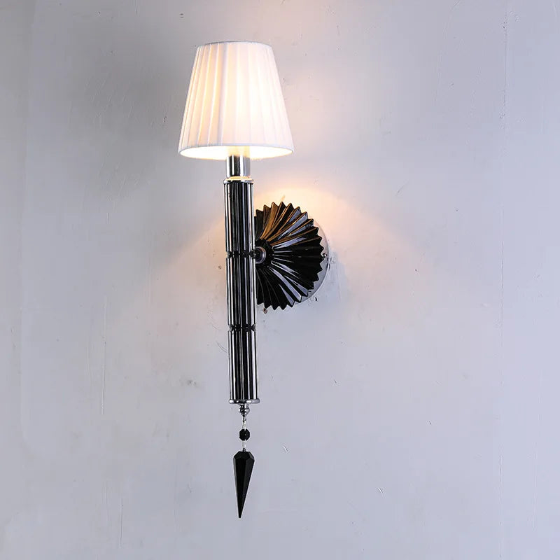 Decorative wall lamp with a unique design on a plain background