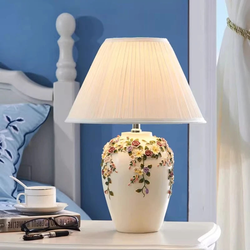 “Artisan floral ceramic lamp with fabric shade for luxury interiors”