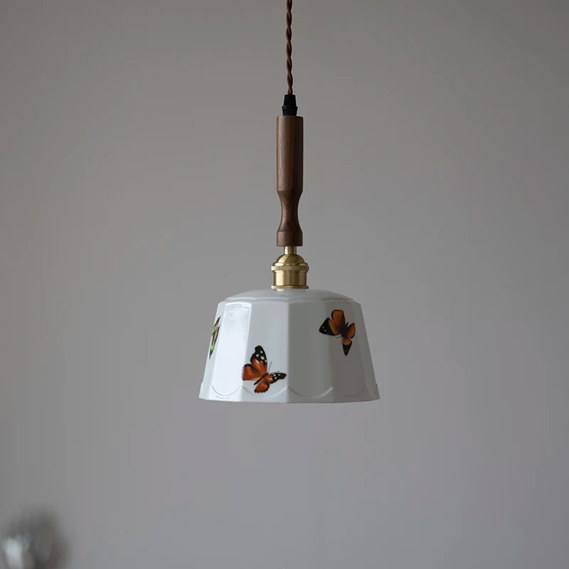 “Artisan pendant light with white ceramic shade and copper”