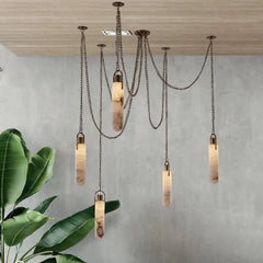 Designer-style multi-light pendant chandelier in a bright interior