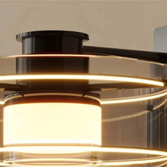 Modern ceiling light fixture with warm glow on a neutral background