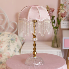 “Chic pink fringe nightstand lamp for elegant bedrooms”