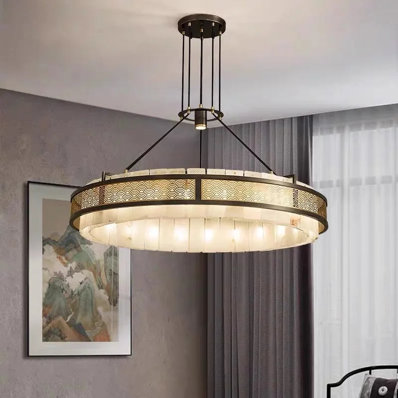 “Classic marble ring chandelier with polished copper finish”