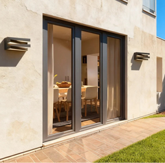 “Sleek outdoor wall sconce installed beside a modern villa entrance.”