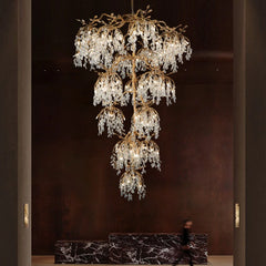 Copper body crystal shade chandelier designed for dramatic staircase foyer lighting
