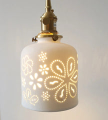 “Copper pull chain LED wall lamp for minimalist decor”