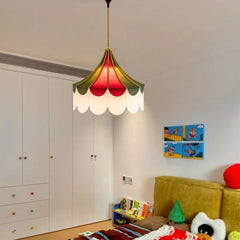 “Mediterranean-style hanging pendant light adding charm to a bedroom corner.”