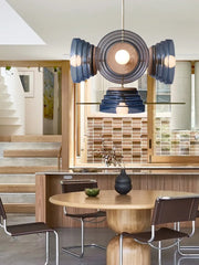 Modern dining room with blue glass artistic chandelier