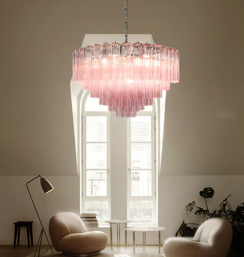 Polished steel fixture with customizable glass shades in a European-inspired interior