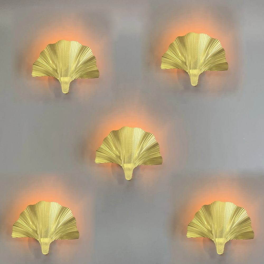 “Designer gold accent lamp up down lighting for nature-inspired decor”