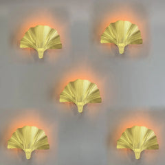 “Designer gold accent lamp up down lighting for nature-inspired decor”