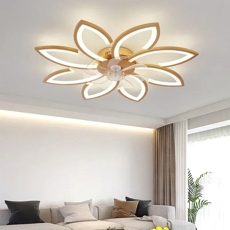 Remote-control pendant flower lamp in black and gold finish, installed in a modern home