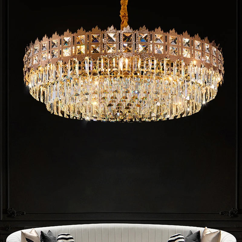 Gold chandelier with crystal accents against a black background