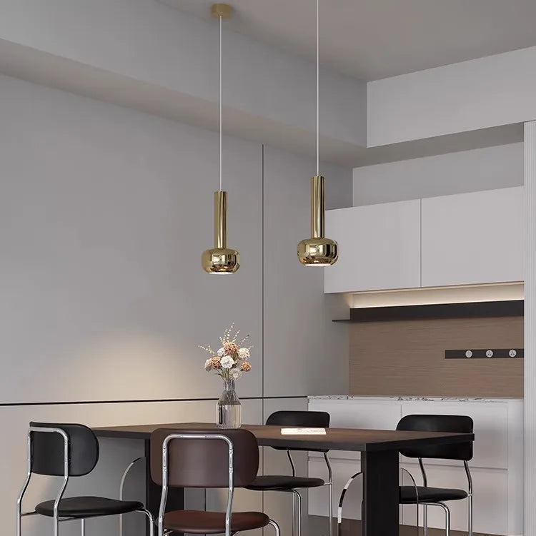 Designer pendant lighting enhancing ambience in a luxury dining space