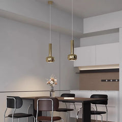 Designer pendant lighting enhancing ambience in a luxury dining space