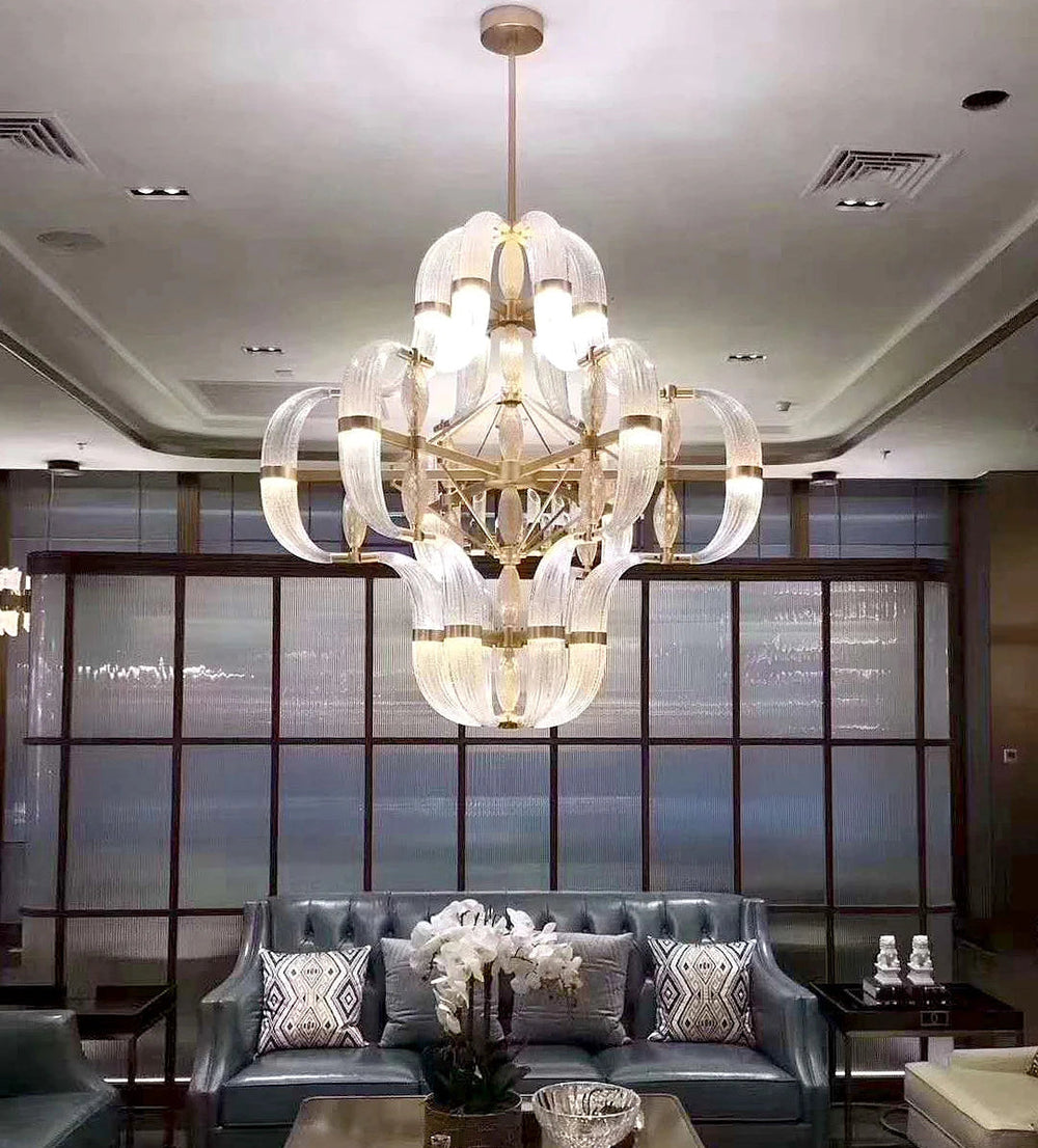 Dramatic semiflush mount chandelier enhancing the ambiance of a grand living room.