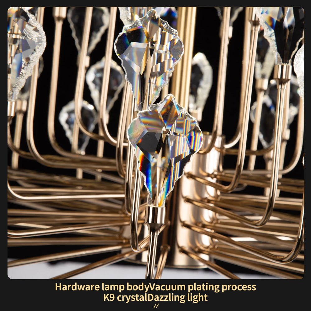 Close-up of crystal lamp parts with gold hardware on a dark background