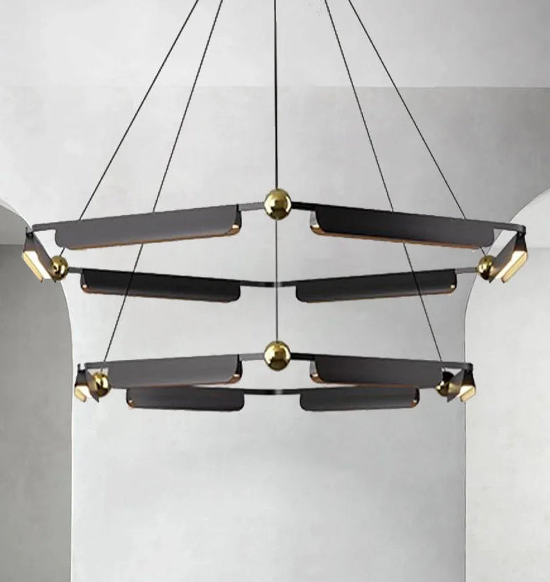 Designer chandelier with up and down light on white ceiling