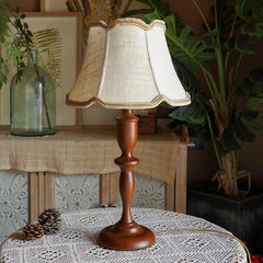 “European solid wood table lamp with scalloped fabric shade”