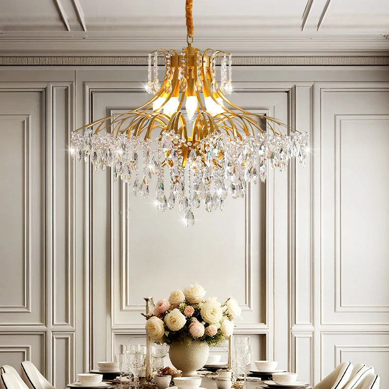 French crystal chain pendant chandelier illuminating a classic dining room