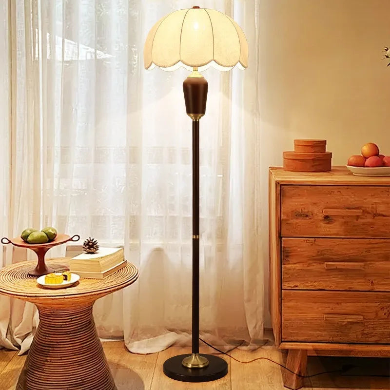 “French retro floor lamp with brushed nickel and scalloped shade”