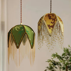 “French vintage tassel pendant with green cloth shade and fringe”