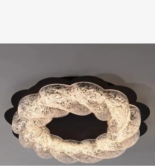 “Artistic Italian resin light fixture with surface mount iron base”

