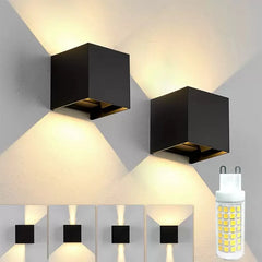 “Black cube LED wall lamp with up-and-down lighting on a modern exterior wall.”