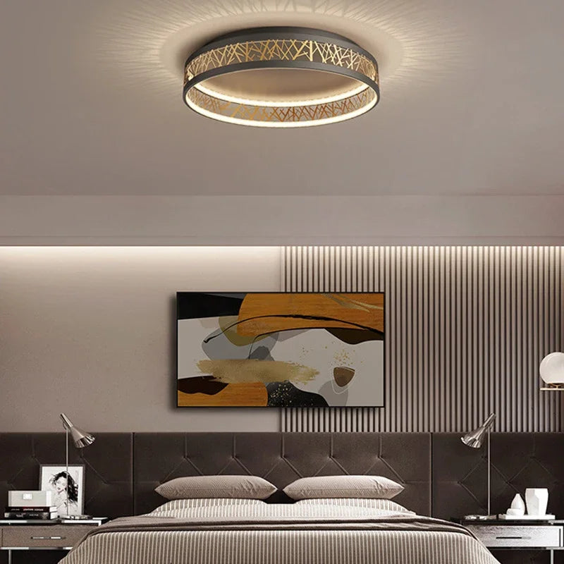 Modern bedroom with a ceiling light fixture, bed, and abstract wall art. Black geometric LED ceiling light for bedroom, study, or foyer