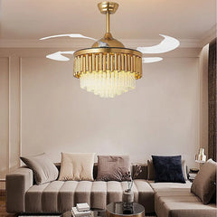 “Gold crystal chandelier ceiling fan with retractable blades in a modern living room.”