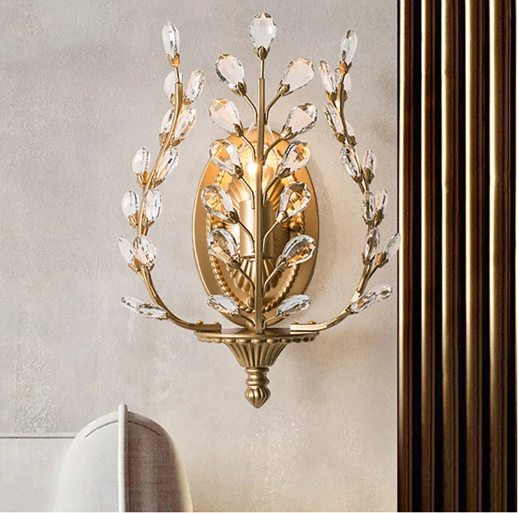 “Gold loft crystal wall sconce with copper body and crystal accents”