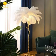 Feathered floor lamp in a living room setting with a couch and decor.