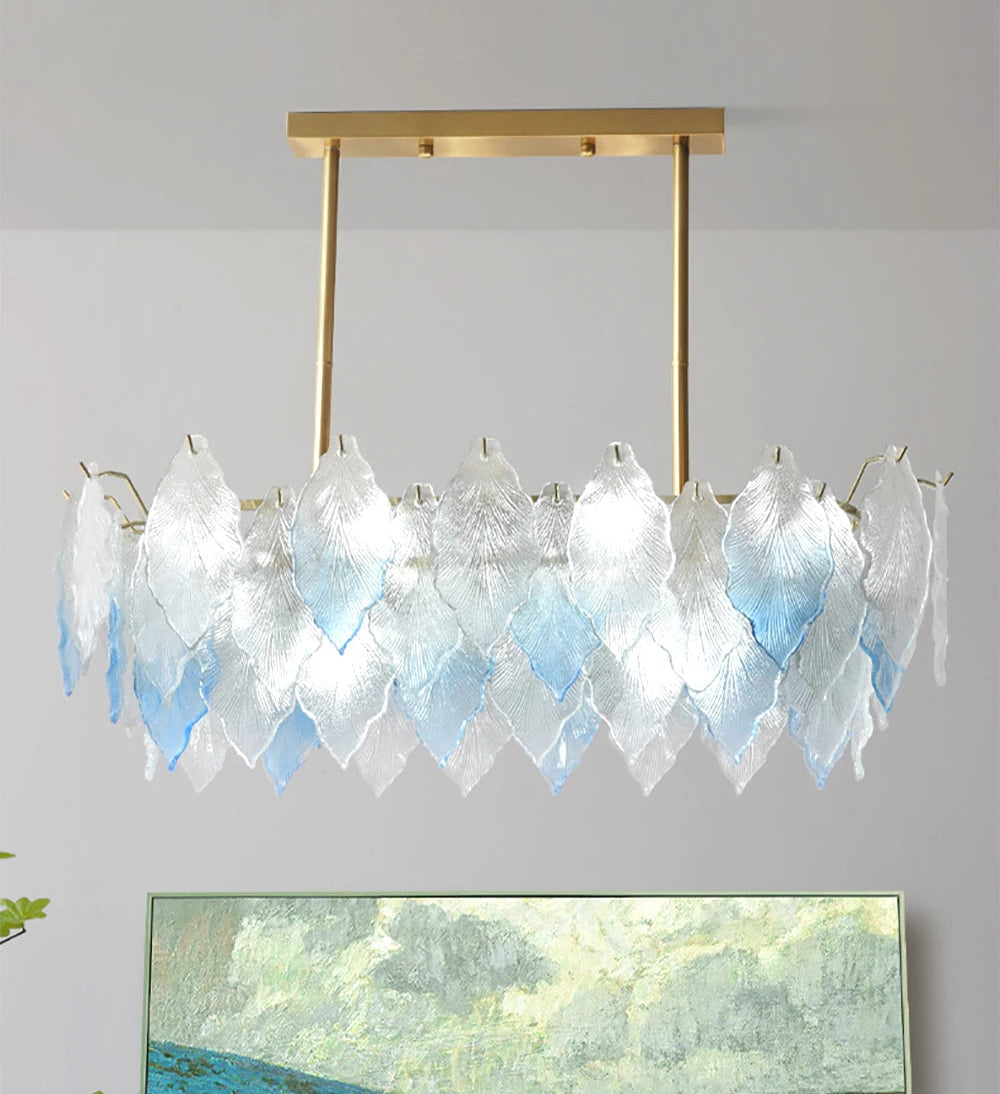  Artistic gradient blue and white stained glass chandelier as ceiling decor above a floral artwork