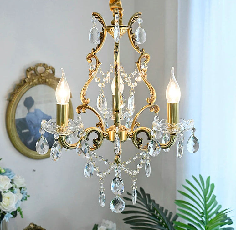 Elegant copper crystal chandelier illuminated in a modern room