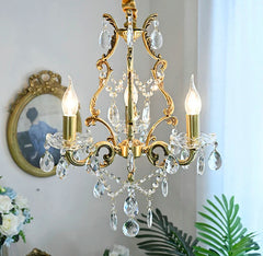 Elegant copper crystal chandelier illuminated in a modern room