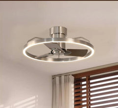 Modern ceiling fan with light fixture on a neutral background