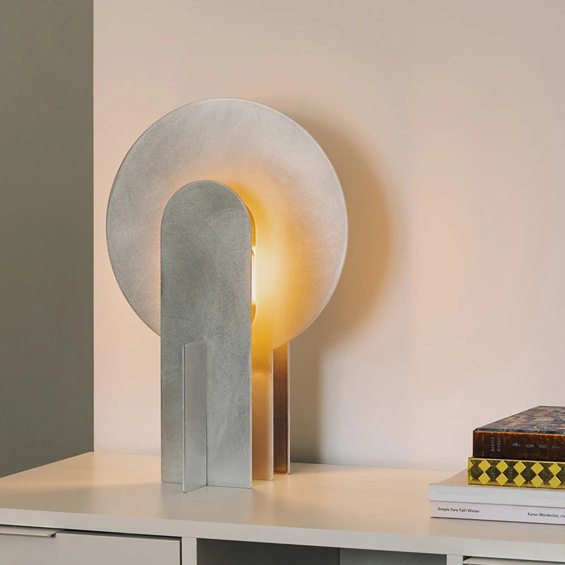 “Industrial aluminum splicing table lamp with sculptural modern design”