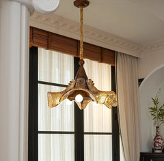 “Classic art glass pendant lamp above dining table”