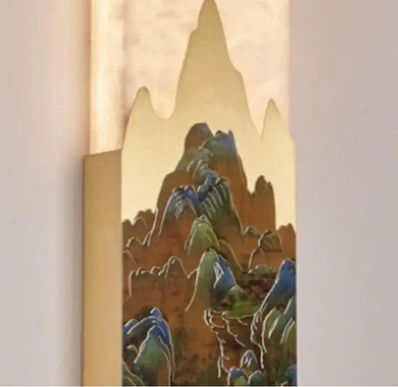 Decorative wall art with mountain landscape design on a beige background