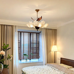 Decorative floral-leaf acrylic pendant lamp featured in boutique hotel decor