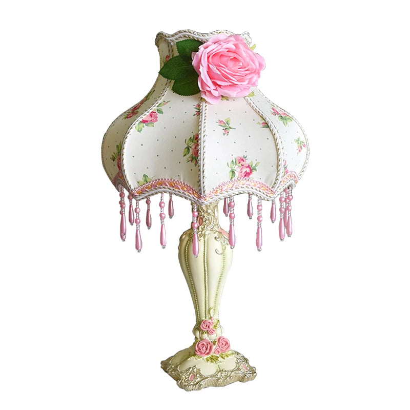 “Liglite floral pink lamp for whimsical bedroom decor and reading”

