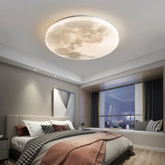 Ceiling light fixture shaped like the moon in a bedroom setting. Liglite LED lunar ceiling lamp with manufacturer's warranty and moon effect