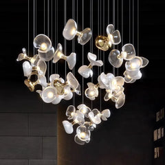 “Liglite statement glass stairwell chandelier for tall spaces”