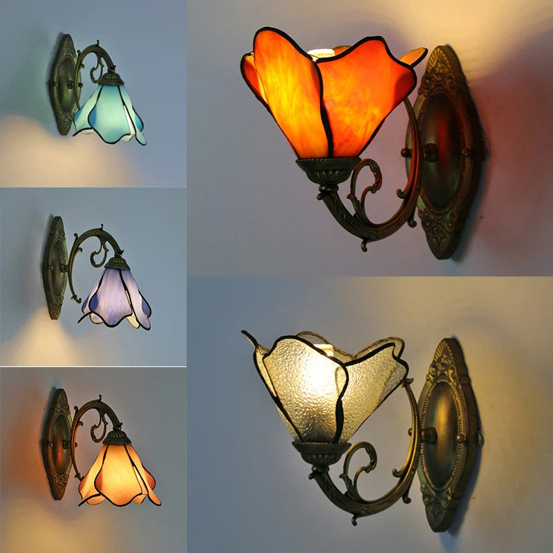 Collection of decorative wall sconces with stained glass shades on a light blue background.