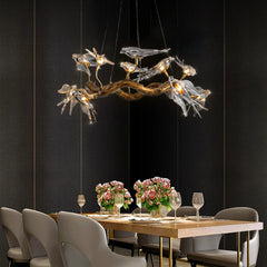 “Liglite sculptural glass bird chandelier for modern designer interiors”