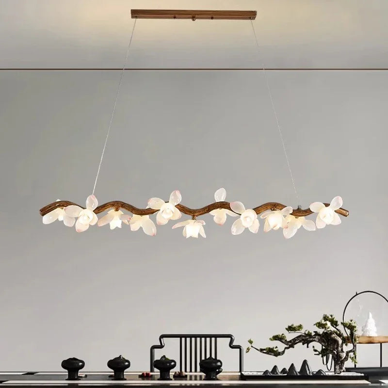 “Liglite walnut chandelier for modern dining space”