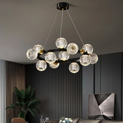 Remote control globe pendant light as statement over contemporary dining