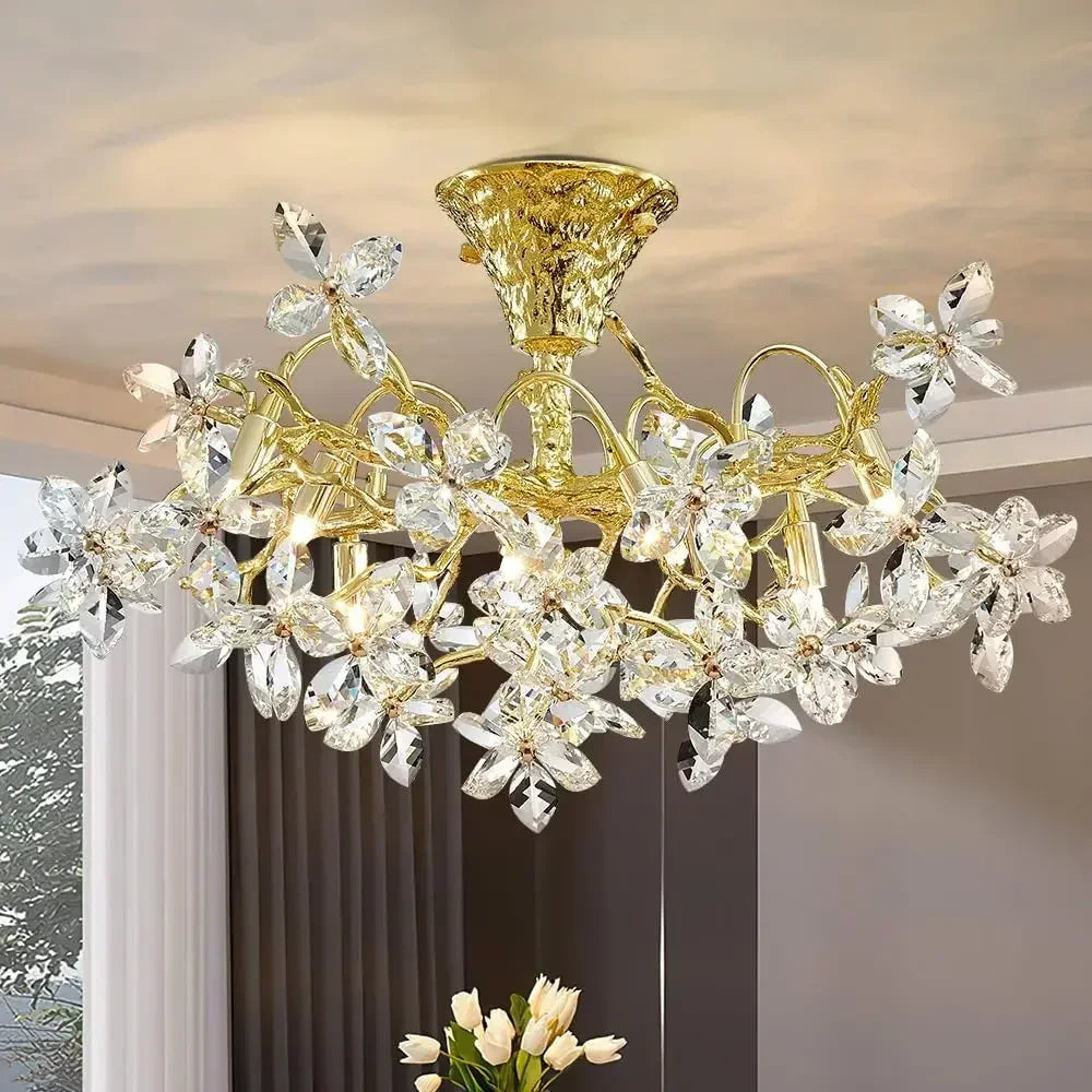 “Upscale LED floral chandelier with gold and clear accents”